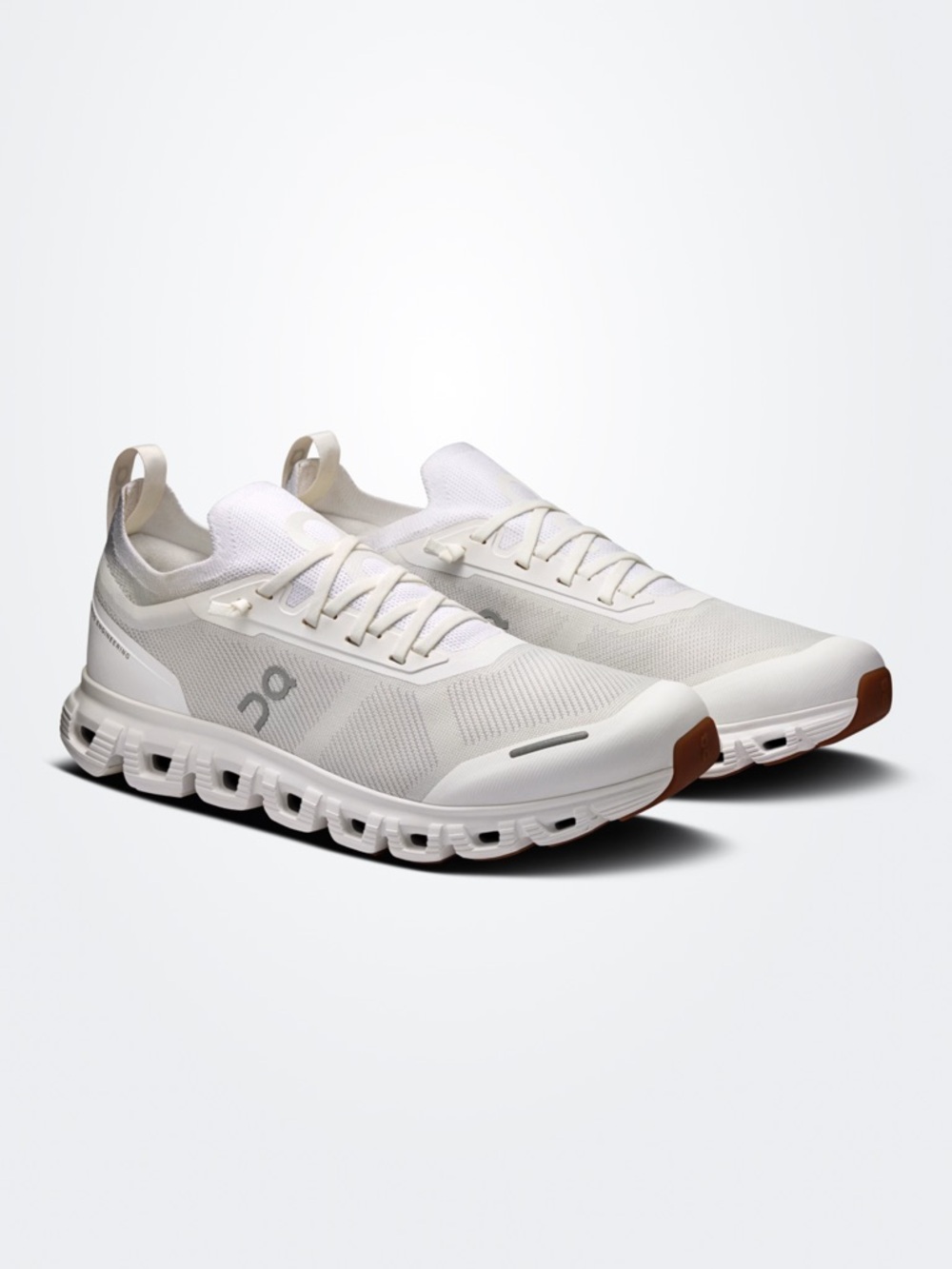 On Running White Sneakers with Brown Toe Accents